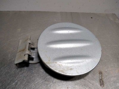 TAPA EXTERIOR COMBUSTIBLE