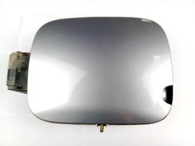 TAPA EXTERIOR COMBUSTIBLE