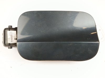 TAPA EXTERIOR COMBUSTIBLE